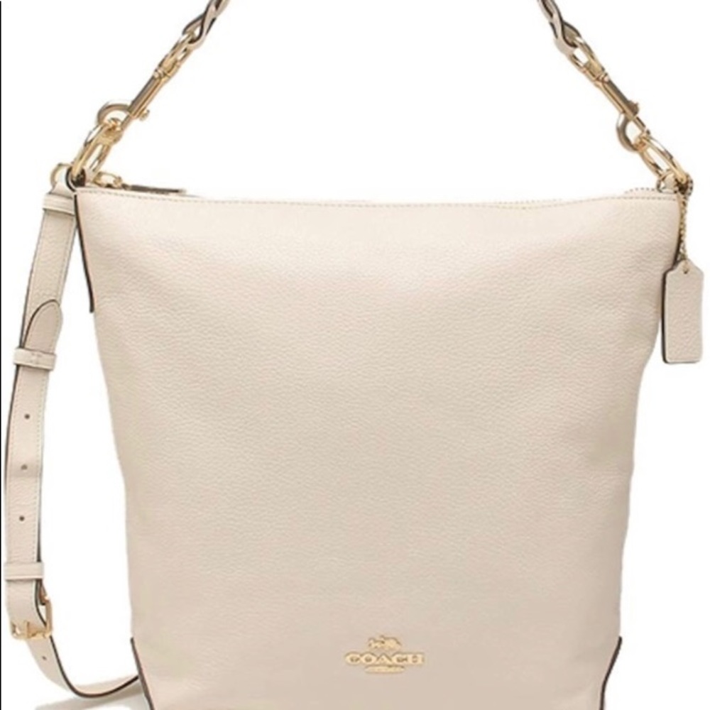 New Authentic Coach never used.
10'' Handle pebble leather 
13''L X 12''H X 4''W